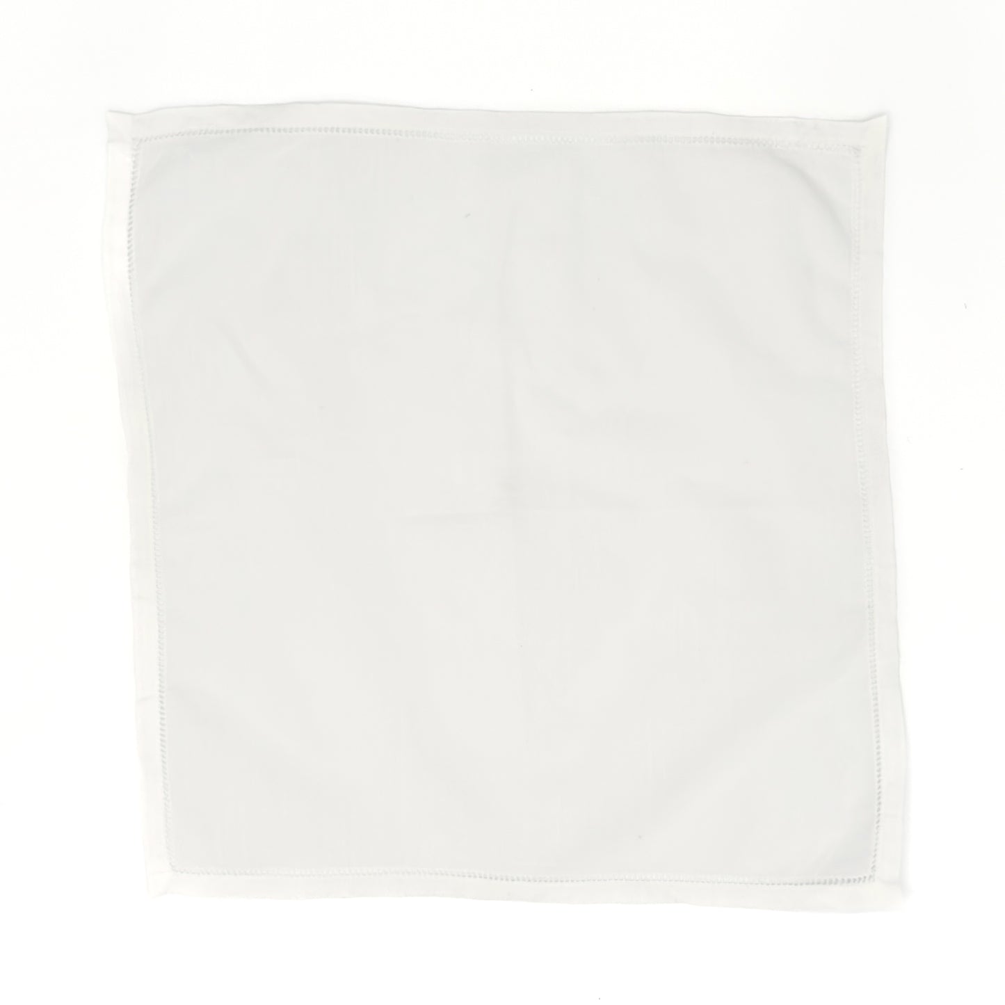 White cotton men’s handkerchief with hemstitch border, 20″ square, pressed flat against a white background.