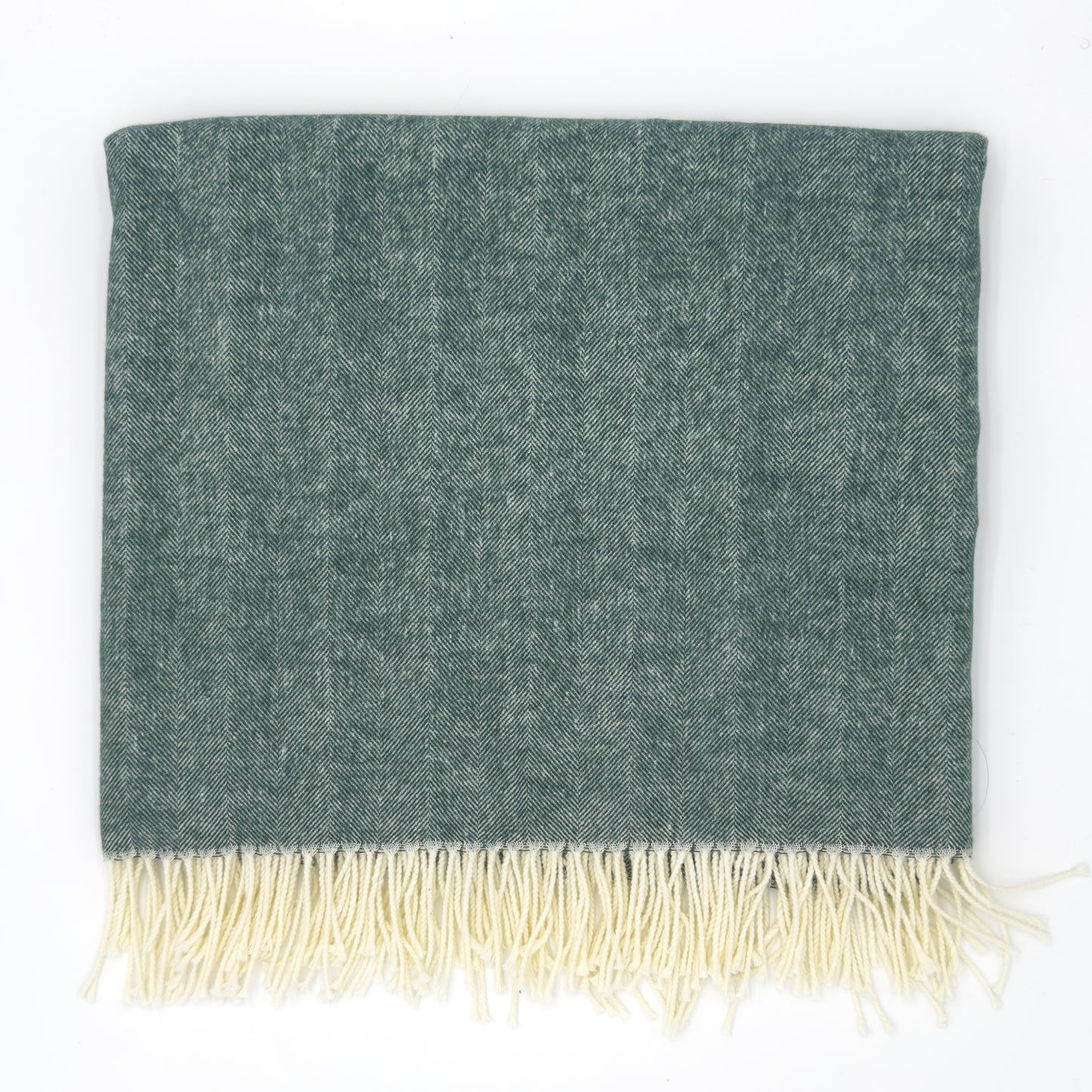 Sage green herringbone throw with ivory fringe, soft woven texture, folded. Add custom embroidery along the bottom-center of the blanket.