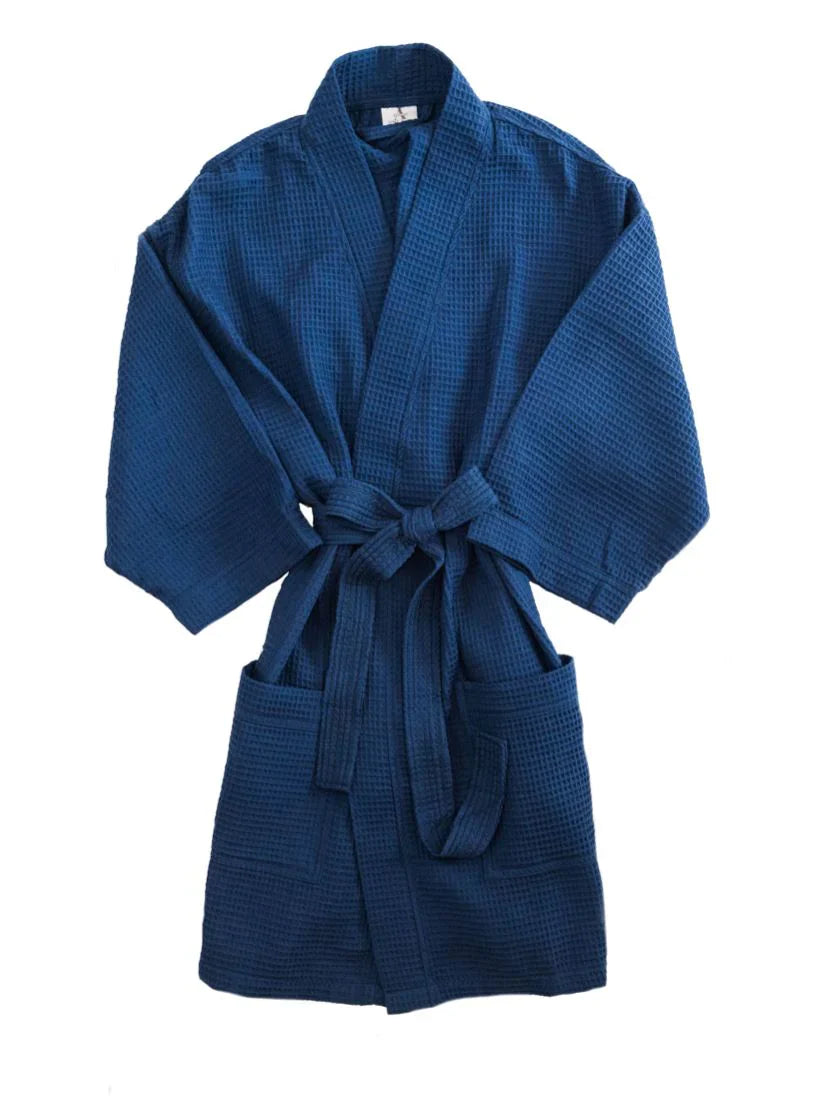 Navy blue knee-length waffle spa robe with tie belt and patch pockets, textured weave. Add custom embroidery to the left chest area.