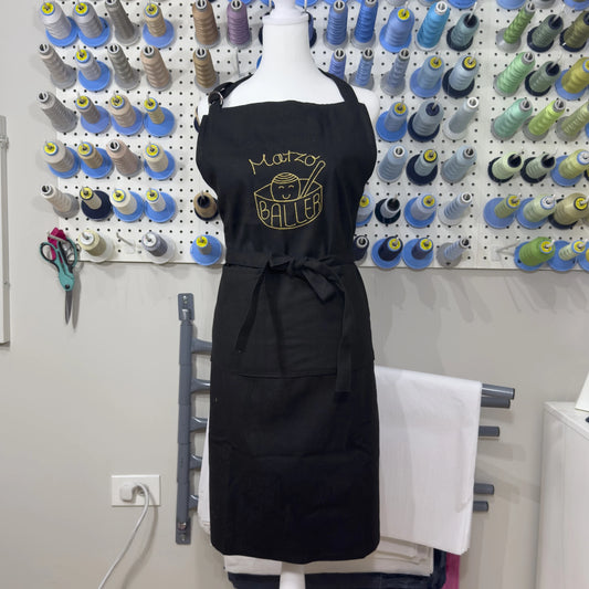 "Matzo Baller" Embroidered Denim Apron - Black with Gold Embroidery