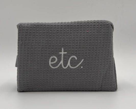 "Etc." Large Waffle Cosmetic Bag-Gray with white stitching