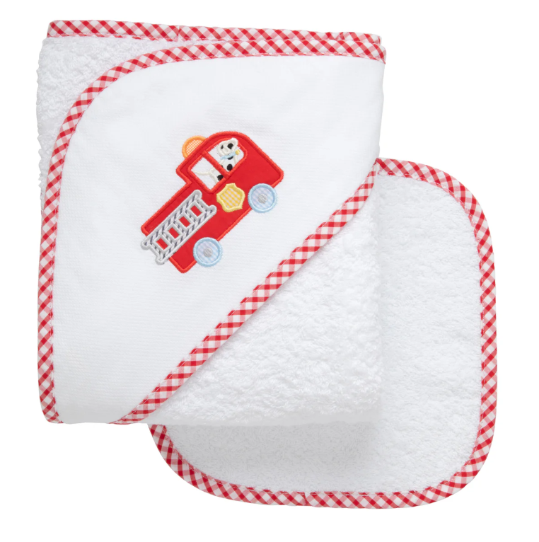 White hooded baby towel with red fire truck appliqué; matching washcloth shown.